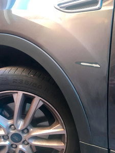 A dented and scratched bumper in Chelmsford - before